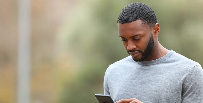 An_African_man_using_smartphone 