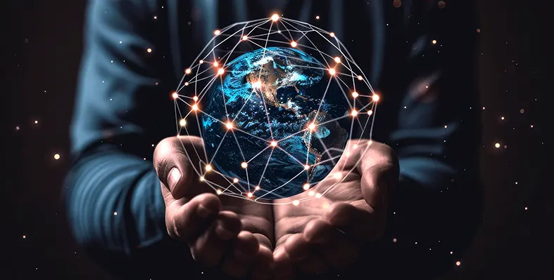 Person holding globe symbolizing global connectivity and technology