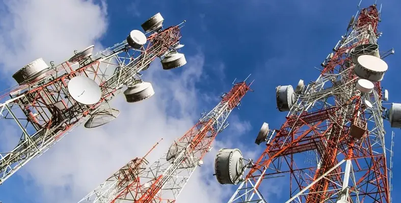 Three_telecom_towers_standing_tall