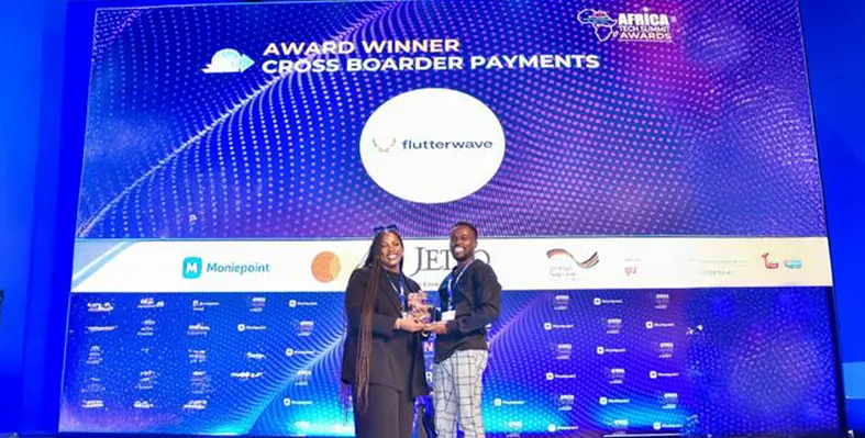 Flutterwave's_company_representative_receiving_an_award_at_Afric_Tech_summit