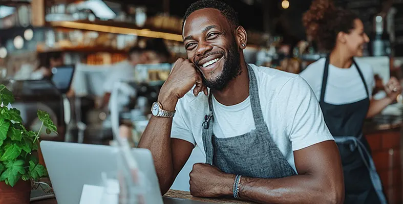 African_man_sitting_with_the_laptop