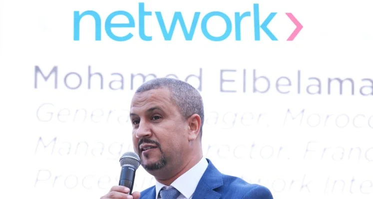 Mohamed Elbelamachi as a speaker at an event