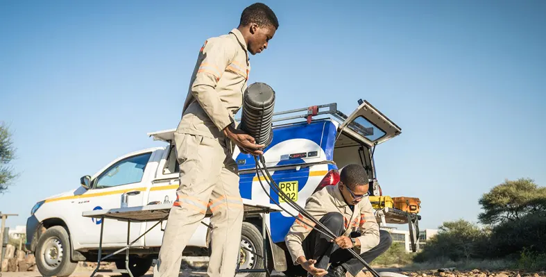 Two men working on Paratus's SADC Highway route