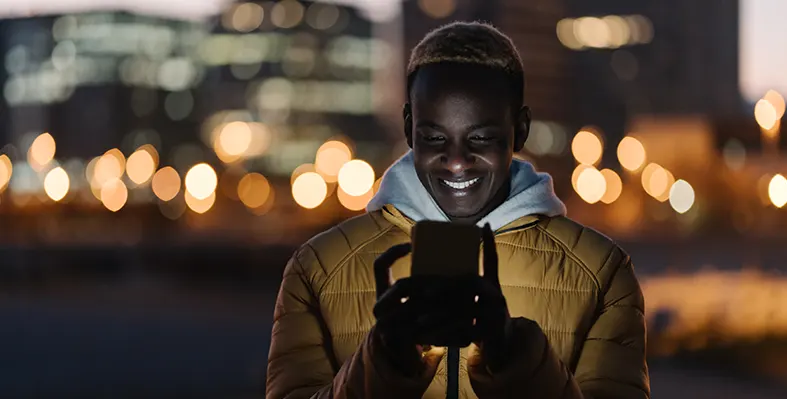 man_talks_mobile_phone_Africa_MTN_2024_report