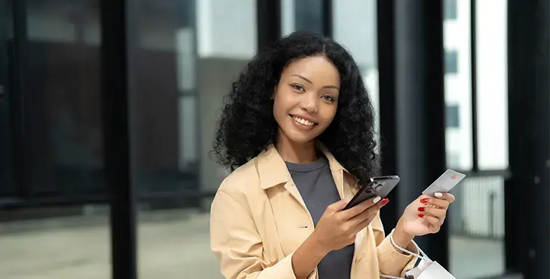 African_women_with_a_phone_and_a_card