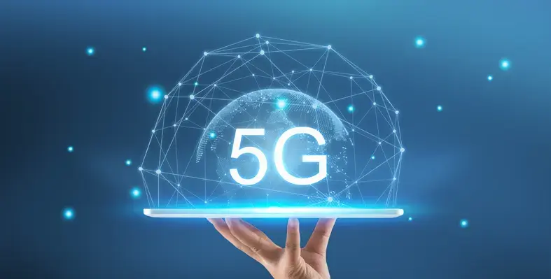Hand holding a phone with a 5G hologram 