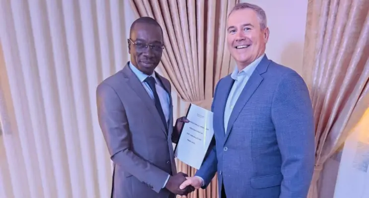 Kyle with Moussa Bocar Thiam, minister of communications, telecommunications and digital, Senegal.