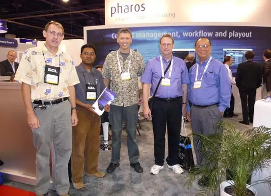 1_-_awr_delegates_confirming_order_on_pharos_booth_at_nab2009